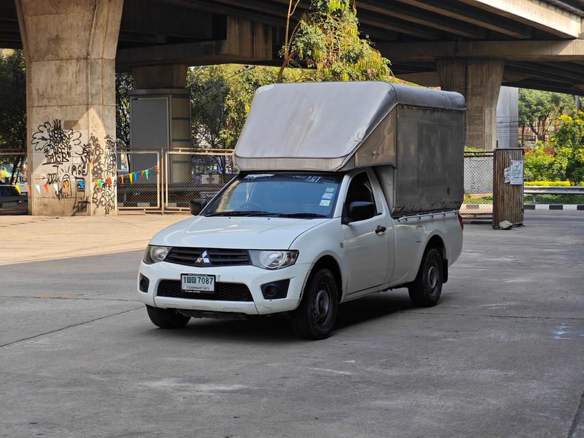 ขายรถ Mitsubishi Triton 2.4 หัวเดียว หลังคาสูง ปี 2015 สีขาว เกียร์ธรรมดา 3