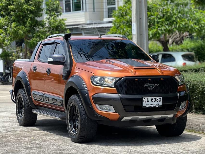 Ford ranger wildtrak 3.2 4WD  เครื่องยนต์: ดีเซล เกียร์: ออโต้  ปี: 2018 สี: ส้ม ไมล์: 104,xxx km.