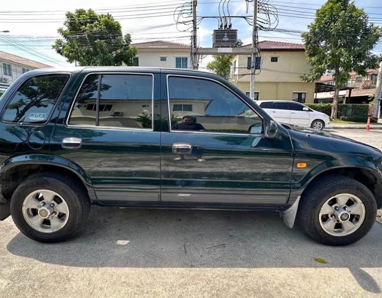 Kia Sportage สีเขียว