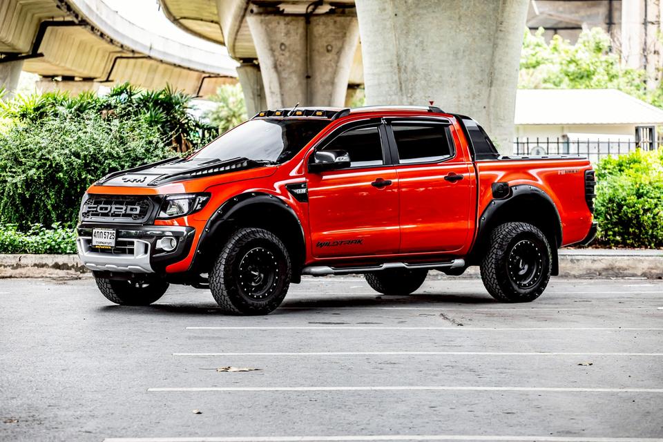 Ford Ranger 2.2 Wildtrak Hi-Lander Double Cab เกียร์ AT ปี 2015 สีส้ม มือเดียวป้ายแดง 10