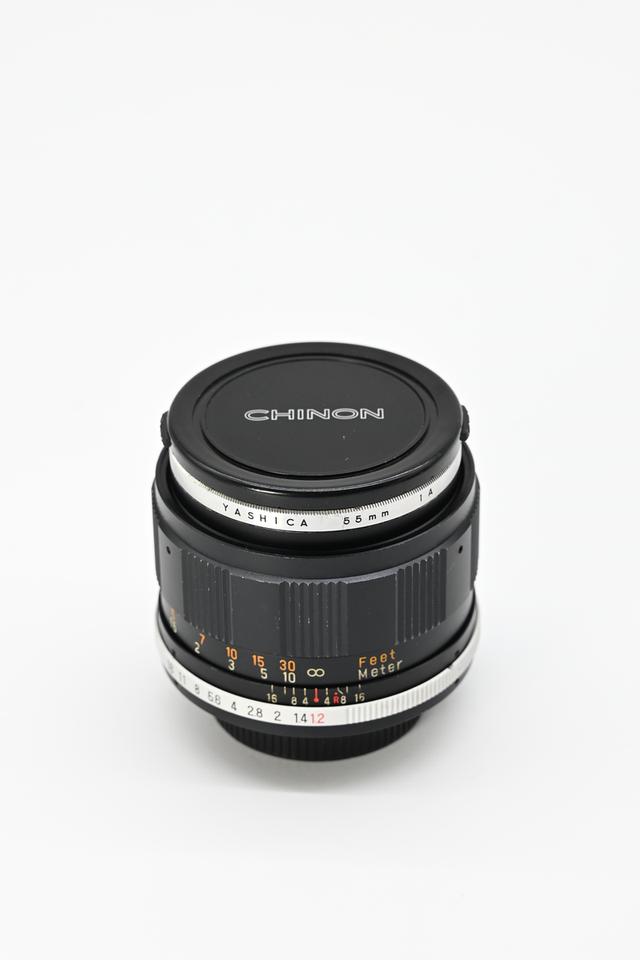 เลนส์มือหมุน Tomioka japan auto chinon 55mm f1.2.M42(rare)