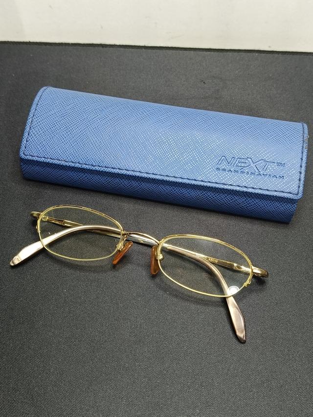 กรอบแว่นตา NEXT SCANDINAVIAN วัสดุ Titanium แท้ ทรงโอวัล สีทอง พร้อมกล่อง