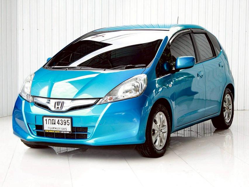 HONDA JAZZ 1.3 HYBRID ปี 2012 โฉม ปี08-14 เกียร์ AUTO สีฟ้า เครื่องยนต์ เบนซิน + ไฟฟ้า ไมล์น้อย 208,884 Km.