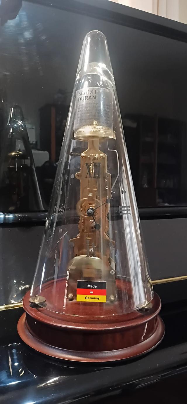 German Franz Hermle skeleton clock with a Schott Duran conical glass dome