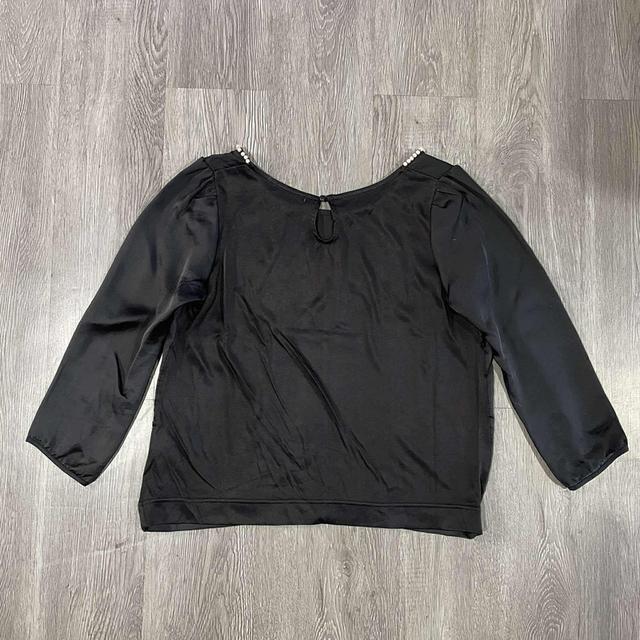 เสื้อแขนสามส่วนมือสอง