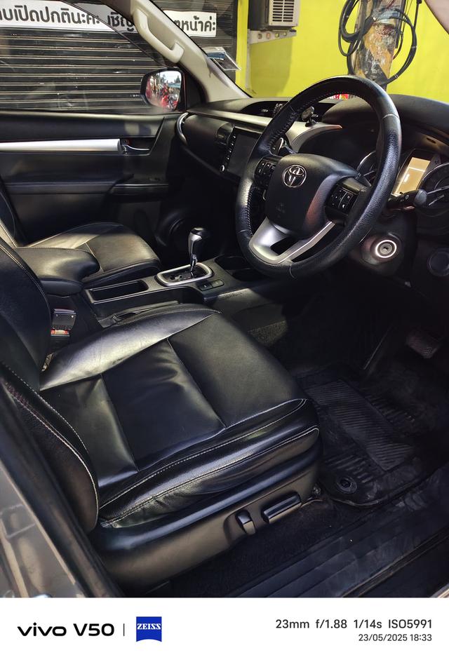 Toyota Hilux Revo ยกสูง 4 ประตูสีบรอนซ์ ดีเซล เกียร์ออโต้ 9