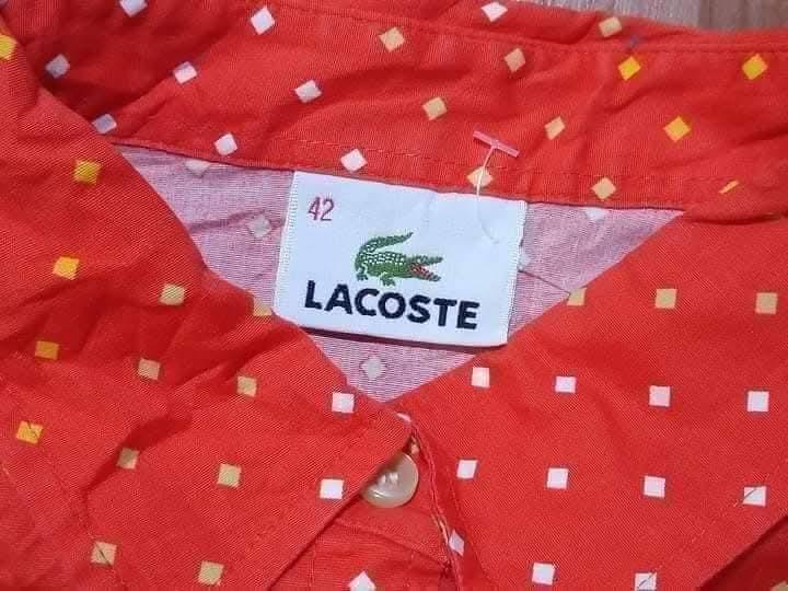 LACOSTE (MADE IN JAPAN) เสื้อแบรนด์แท้ สีส้มสดใส ปักโลโก้อก ผ้าคอตต้อนผสม ยืดหยุ่น ใส่สบาย สภาพดีมาก รูปย่อยที่ 3