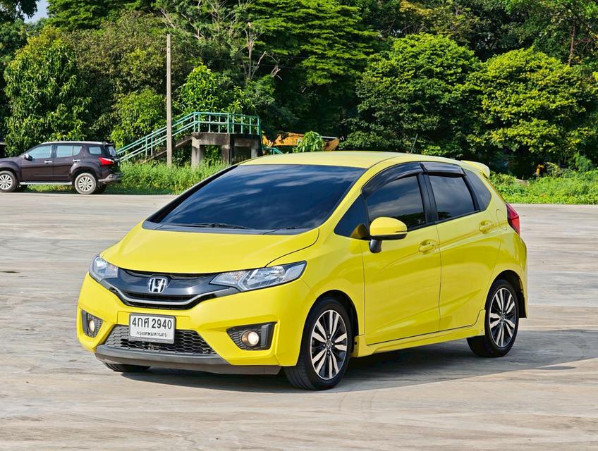 HONDA JAZZ GK 1.5 SV Top Y2015. สีเหลือง ออโต้ 7