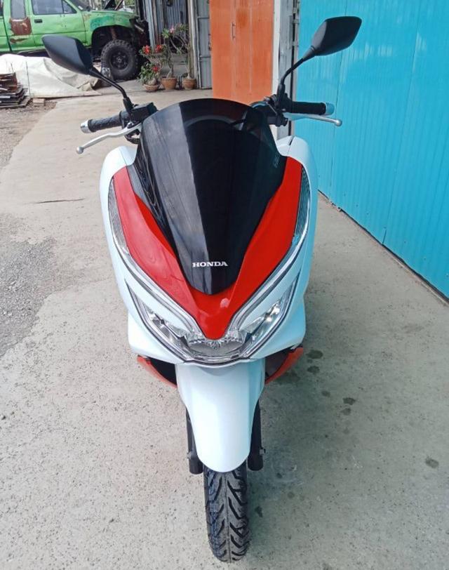 Honda PCX 150 สีขาว - ส้ม