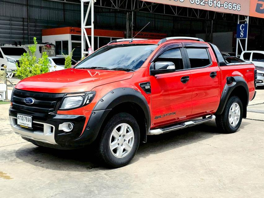 รหัสรถ SEZ7698 📌 Ford Ranger 4 ประตู 2.2 Wildtrak Hi-Rider เกียร์ ออโต้ สี ส้ม ปี 2015