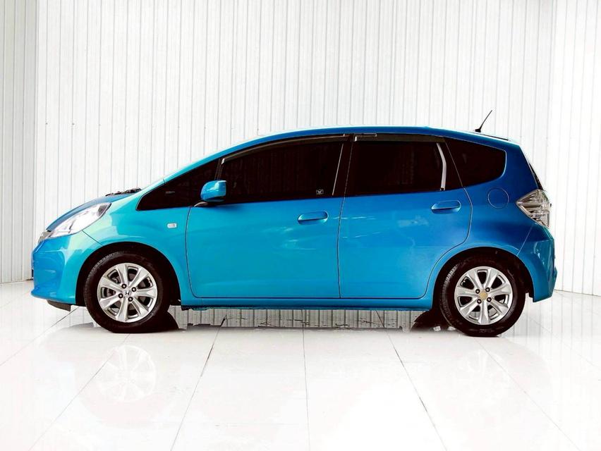 HONDA JAZZ 1.3 HYBRID ปี 2012 โฉม ปี08-14 เกียร์ AUTO สีฟ้า เครื่องยนต์ เบนซิน + ไฟฟ้า ไมล์น้อย 208,884 Km.