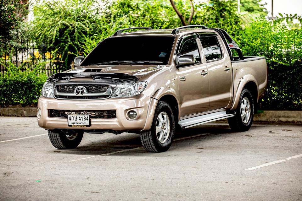 Toyota Vigo Double Cab 4 ประตู 2.5G ดีเซล เกียร์ Auto ปี2009 สีน้ำตาล 