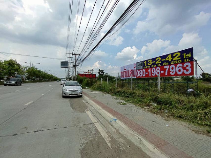ขาย ที่ดิน ปทุมธานี ใกล้แยกบางคูวัด 13 ไร่ 2 งาน 42.2 ตรว ติดถนนใหญ่ ตรงข้ามฟลอร่าวิลล์ ผังสีชมพู 6
