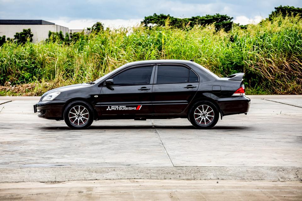 Mitsubishi Lancer Cedia 1.6 GLX เกียร์ Auto ปี 2011 สีดำ  9