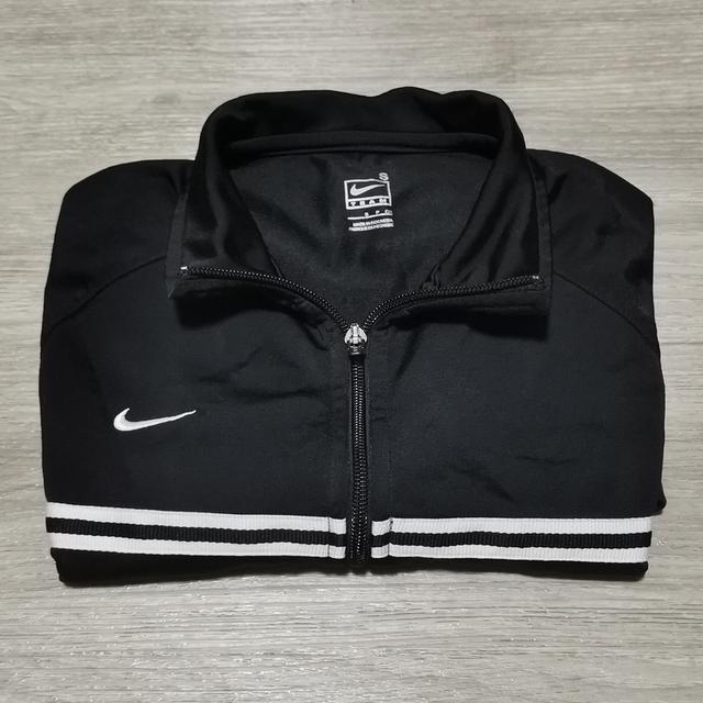 เสื้อแจ็คเก็ตผ้าวอม Nike